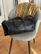 THE LEOPARD DUFFLE BAG