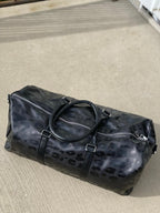 THE LEOPARD DUFFLE BAG